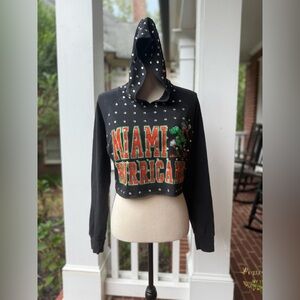 upcycled University of Miami cropped rhinestone sweatshirt.